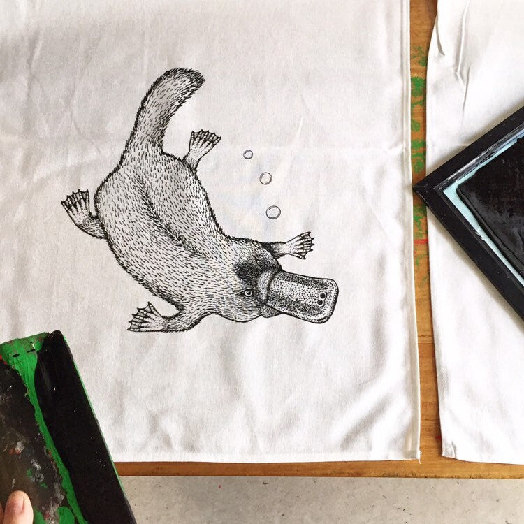 Hand printed platypus tea towel